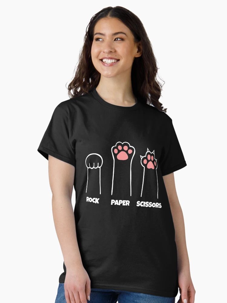 Women Black t-shirt featuring three illustrated cat paws labeled “Rock,” “Paper,” and “Scissors” in white and pink