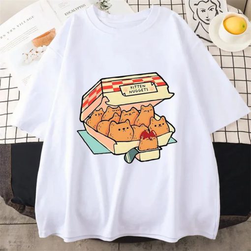 White t-shirt with a graphic of a fast food box labeled “Kitten Nuggets” filled with cat-shaped nuggets and dipping sauce.
