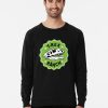 Men Black sweatshirt with a green badge graphic featuring a T-Rex skull and the words “T-Rex Ranch.”