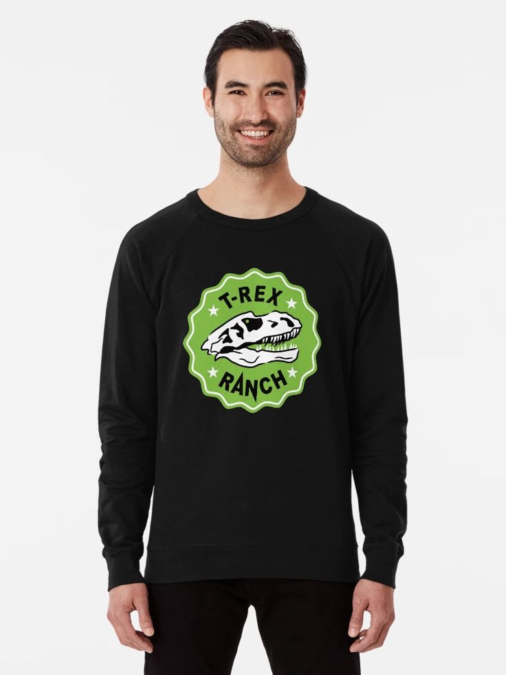Men Black sweatshirt with a green badge graphic featuring a T-Rex skull and the words “T-Rex Ranch.”