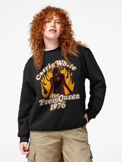Black sweatshirt with vintage Carrie White graphic and “Prom Queen 1976” horror movie reference