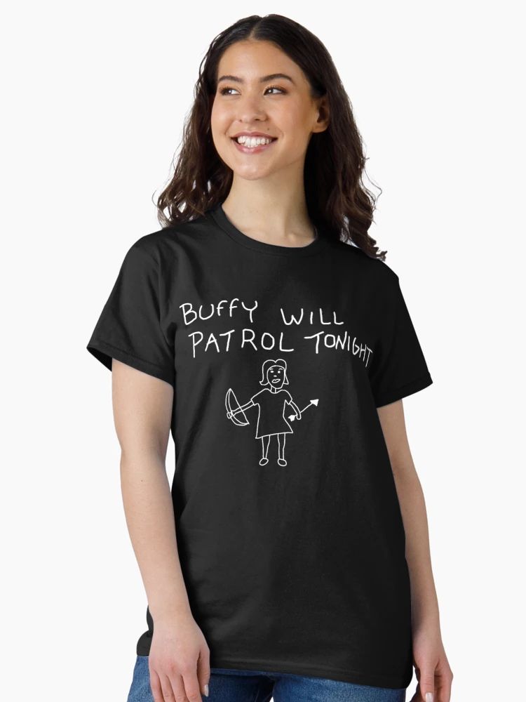 Black t-shirt with hand-drawn stick figure and the phrase “Buffy Will Patrol Tonight” in playful handwritten font