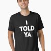 Black t-shirt with bold white text saying “I TOLD YA” in stacked, capitalized font.