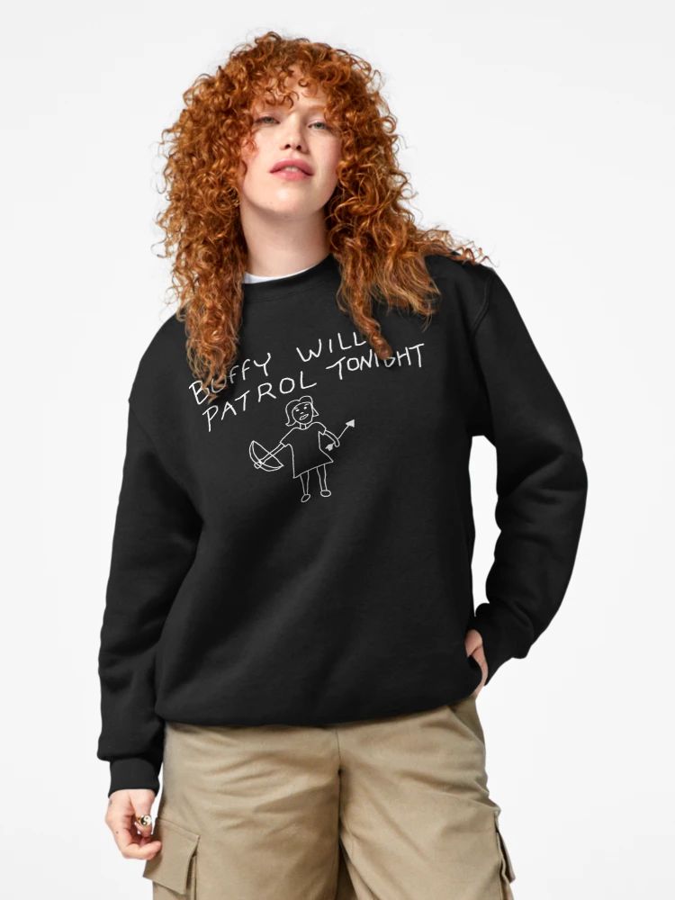Black sweatshirt featuring a white stick figure drawing of Buffy with humorous vampire-slaying text