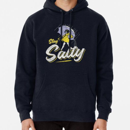 Black hoodie with retro “Stay Salty” text and vintage salt girl parody graphic holding umbrella