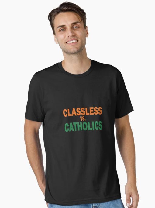 Men Black T-Shirt with bold “Classless vs Catholics” text in orange and green collegiate font, worn by a male model.