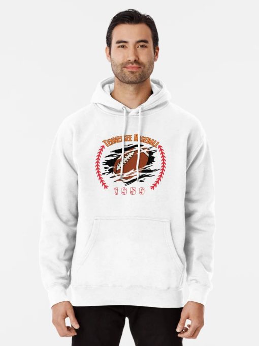 White Hoodie with a football bursting through a graphic surrounded by red baseball stitches, labeled “Tennessee Baseball 1959,” worn by male model.