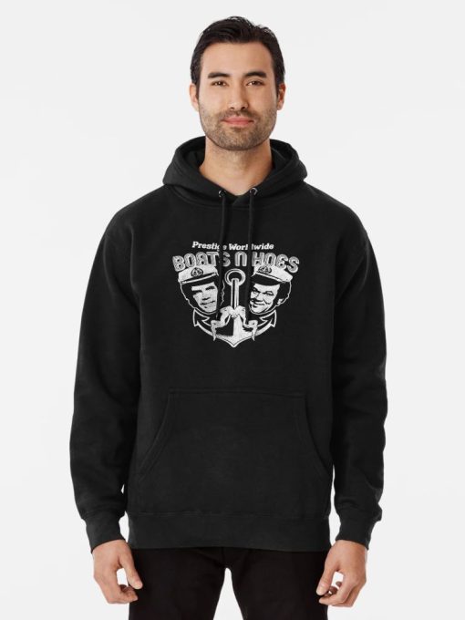 Black Hoodie with distressed white “Boats N Hoes” design featuring two men in captain hats and anchor graphic.
