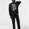 Men Black sweatshirt with Queens College New York seal in white varsity-style font