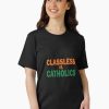 Women Black Tee with bold “Classless vs Catholics” text in orange and green collegiate font, worn by a male model.