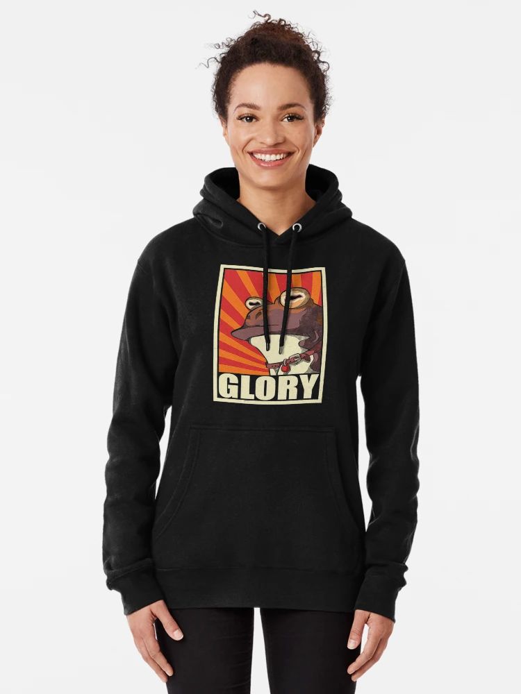 Black Hoodie with vintage-style GLORY frog meme design in red, orange, and beige