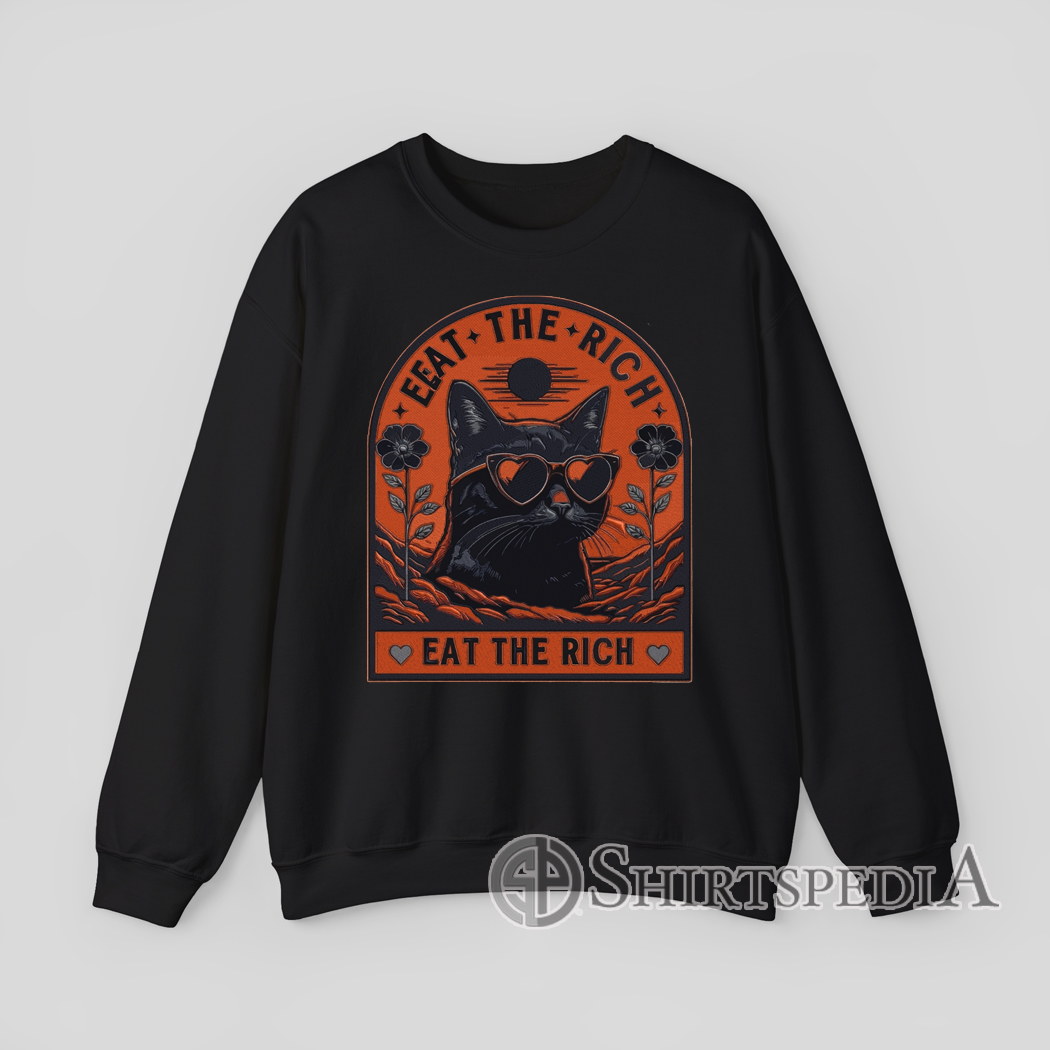 Black Sweatshirt with embroidery-style print of a cat wearing heart sunglasses and text “Eat The Rich”.