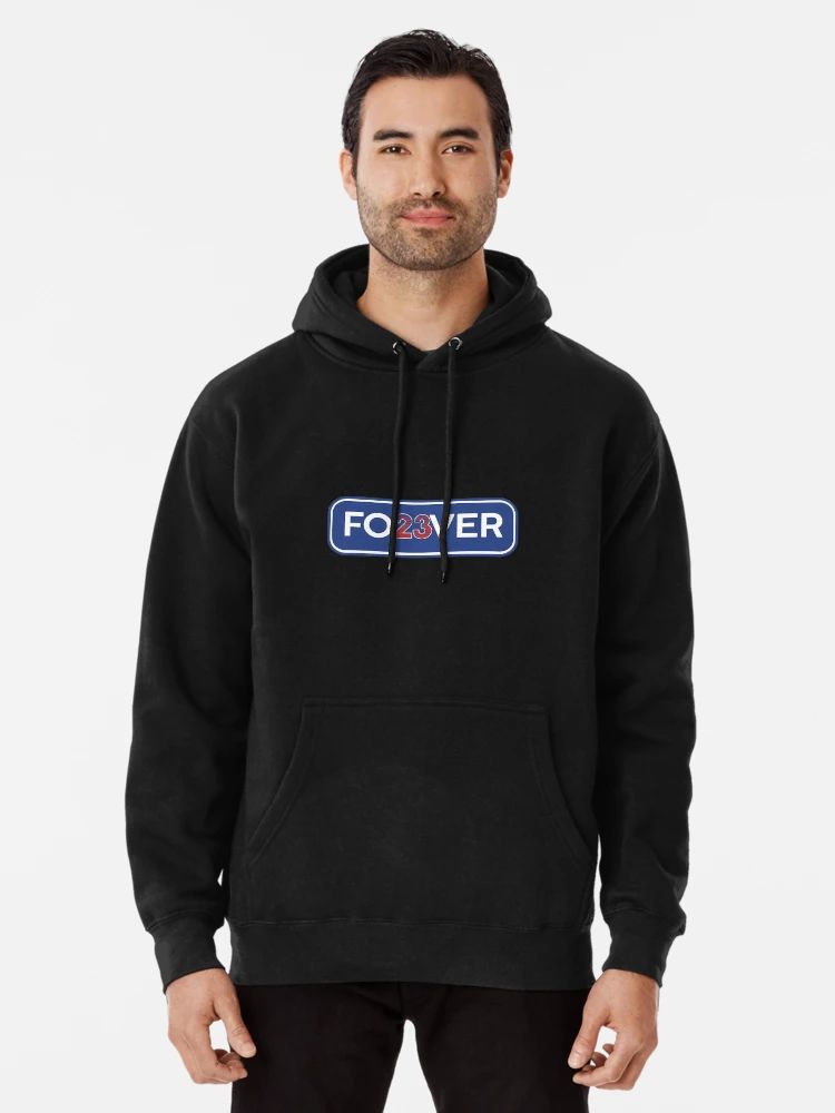 FO23VER Ryne Sandberg Chicago Cubs Inspired Hoodie Man wearing black hoodie with “FO23VER” design in blue and white with red 23 — tribute to Cubs legend Ryne Sandberg.