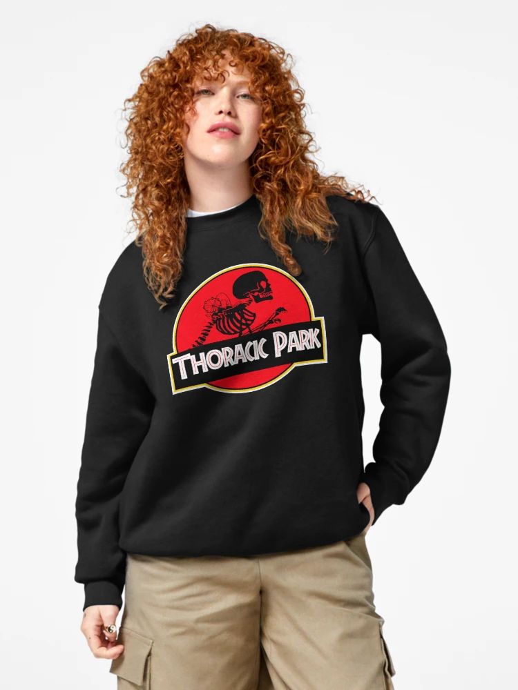 Men Black nursing Sweatshirt with a parody red-and-yellow logo showing a ribcage skeleton and text “Thoracic Park” in bold font
