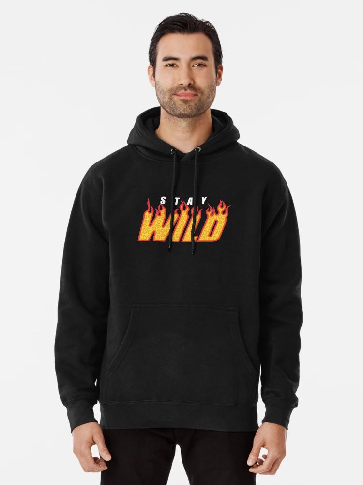 Stay Wild Flame Bold Graphic Streetwear Hoodie Men Black hoodie with “Stay Wild” flame-text design in yellow and red, worn by a smiling male model