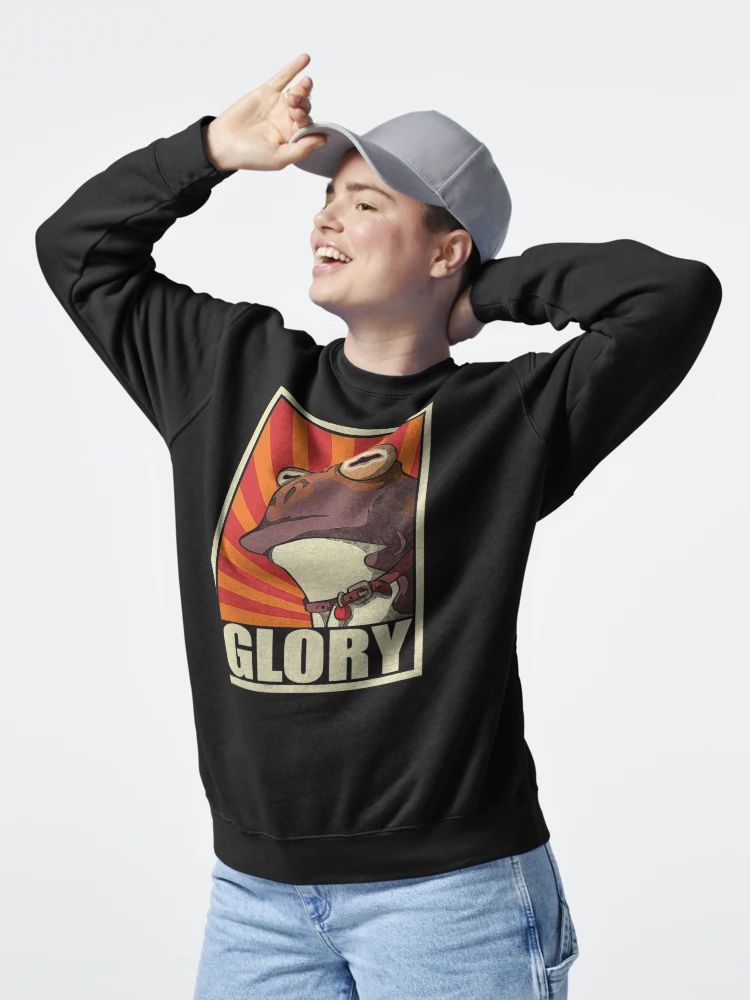 Black sweatshirt with vintage-style GLORY frog meme design in red, orange, and beige