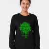 Black sweatshirt with distressed green tree graphic and bold “More Trees Less Assholes” environmental slogan
