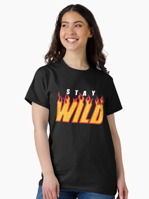 Women Black T-Shirt with “Stay Wild” flame-text design in yellow and red, worn by a smiling male model