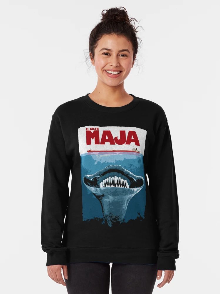 Black Sweatshirt with retro movie-poster design of a giant sea creature and “El Gran Maja” text in bold red letters.