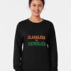 Black Sweatshirt with bold “Classless vs Catholics” text in orange and green collegiate font, worn by a male model.