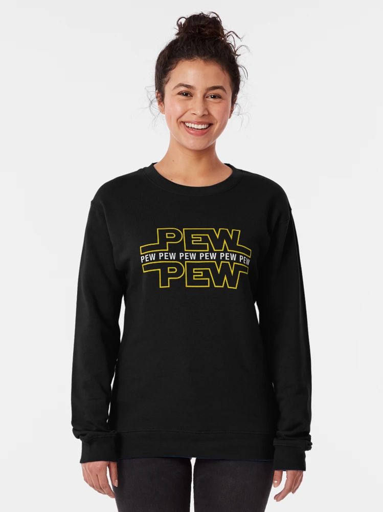 Black sweatshirt with yellow “PEW PEW PEW” text in a sci-fi parody font, worn by a smiling woman