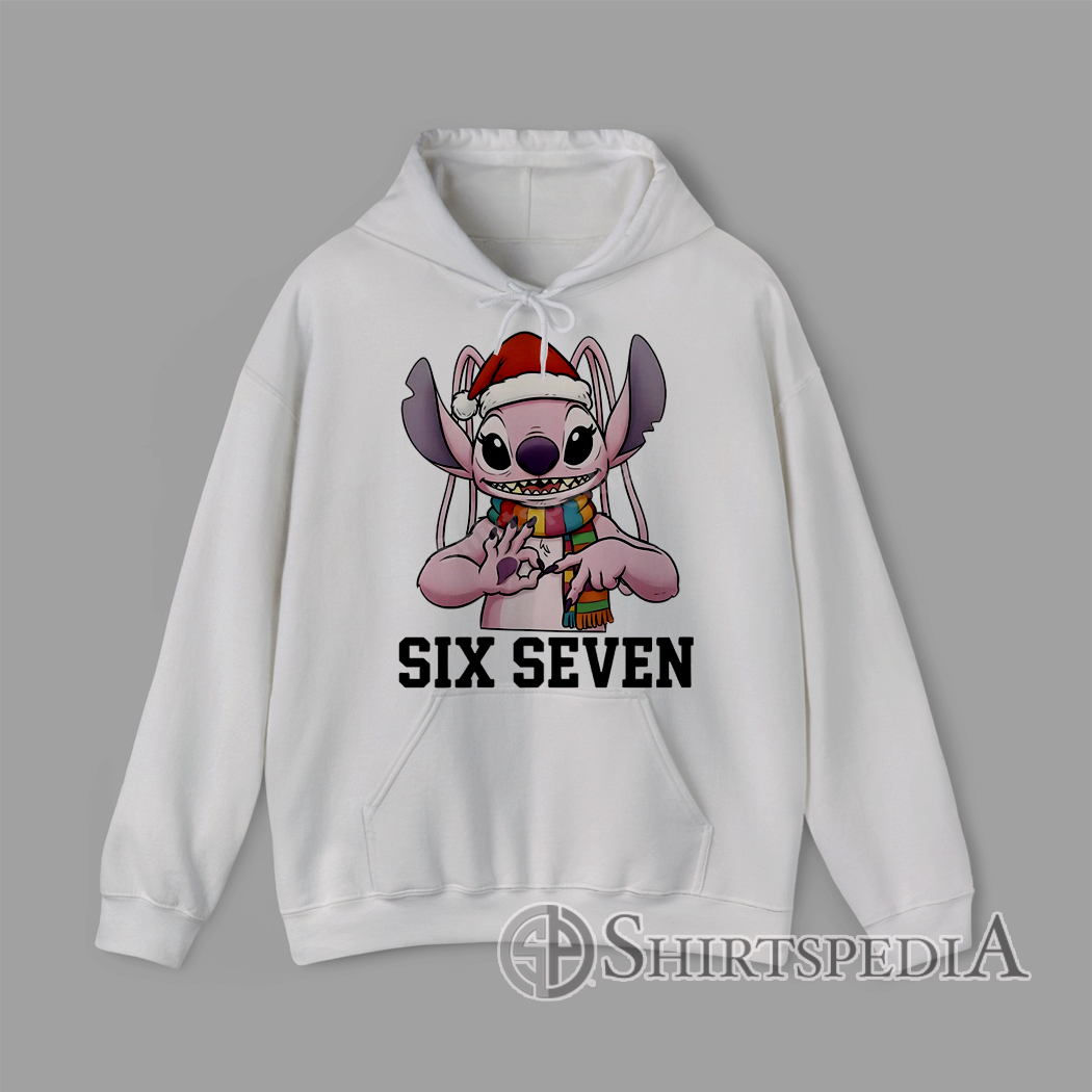 Six Seven Christmas Stitch Alien Hoodie Cartoon pink alien creature wearing Santa hat and scarf making hand sign with text Six Seven Christmas graphic Hoodie