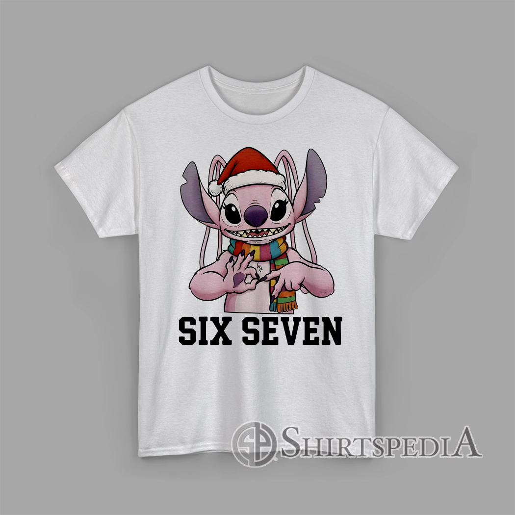 Six Seven Christmas Stitch Alien T-Shirt Cartoon pink alien creature wearing Santa hat and scarf making hand sign with text Six Seven Christmas graphic T-Shirt