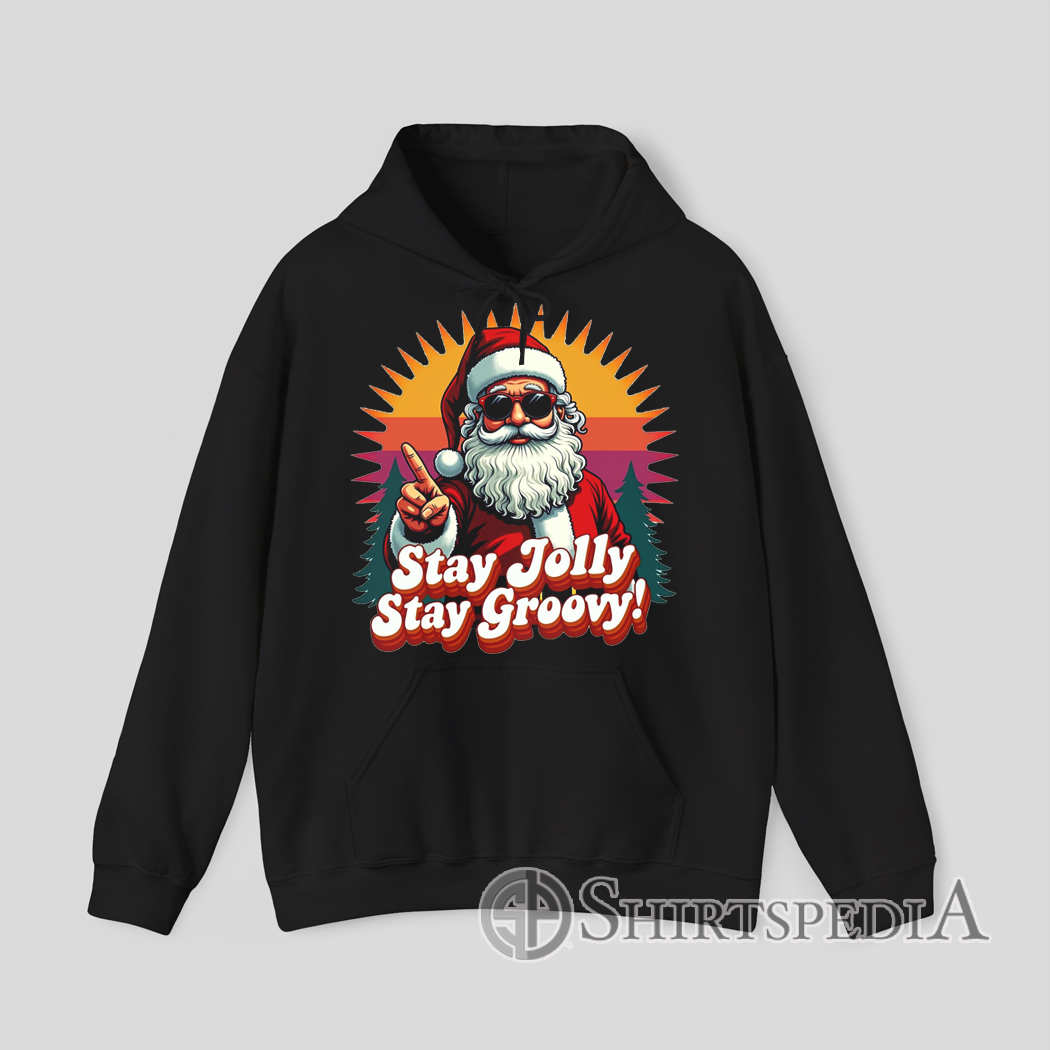 Vintage sunset Santa illustration with Stay Jolly Stay Groovy phrase on holiday hoodie