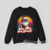 Groovy 70s-style Santa graphic with retro colors and festive message printed on cozy Christmas sweatshirt
