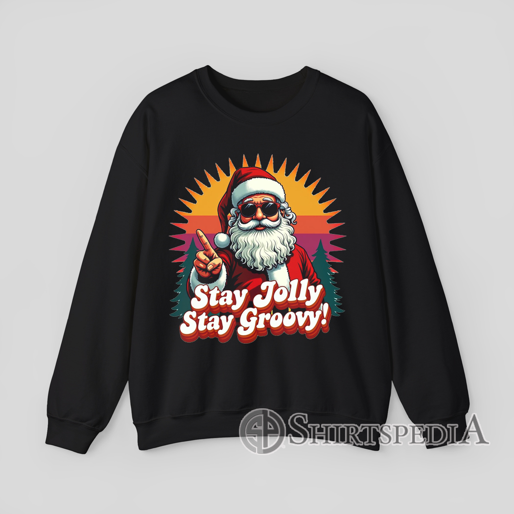 Groovy 70s-style Santa graphic with retro colors and festive message printed on cozy Christmas sweatshirt