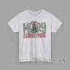 T-Shirt Rustic Merry Christmas design with floral letters, gingham print text, and watercolor Christmas tree illustration