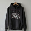 Heavyweight black streetwear hoodie with an adjustable drawstring hood, displaying a large central graphic of a cat crowd surfing at a rock concert.