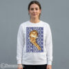 Women Unisex black crewneck pullover sweatshirt featuring a large central graphic of an ironic sad orange tabby cat in a vintage meme style.