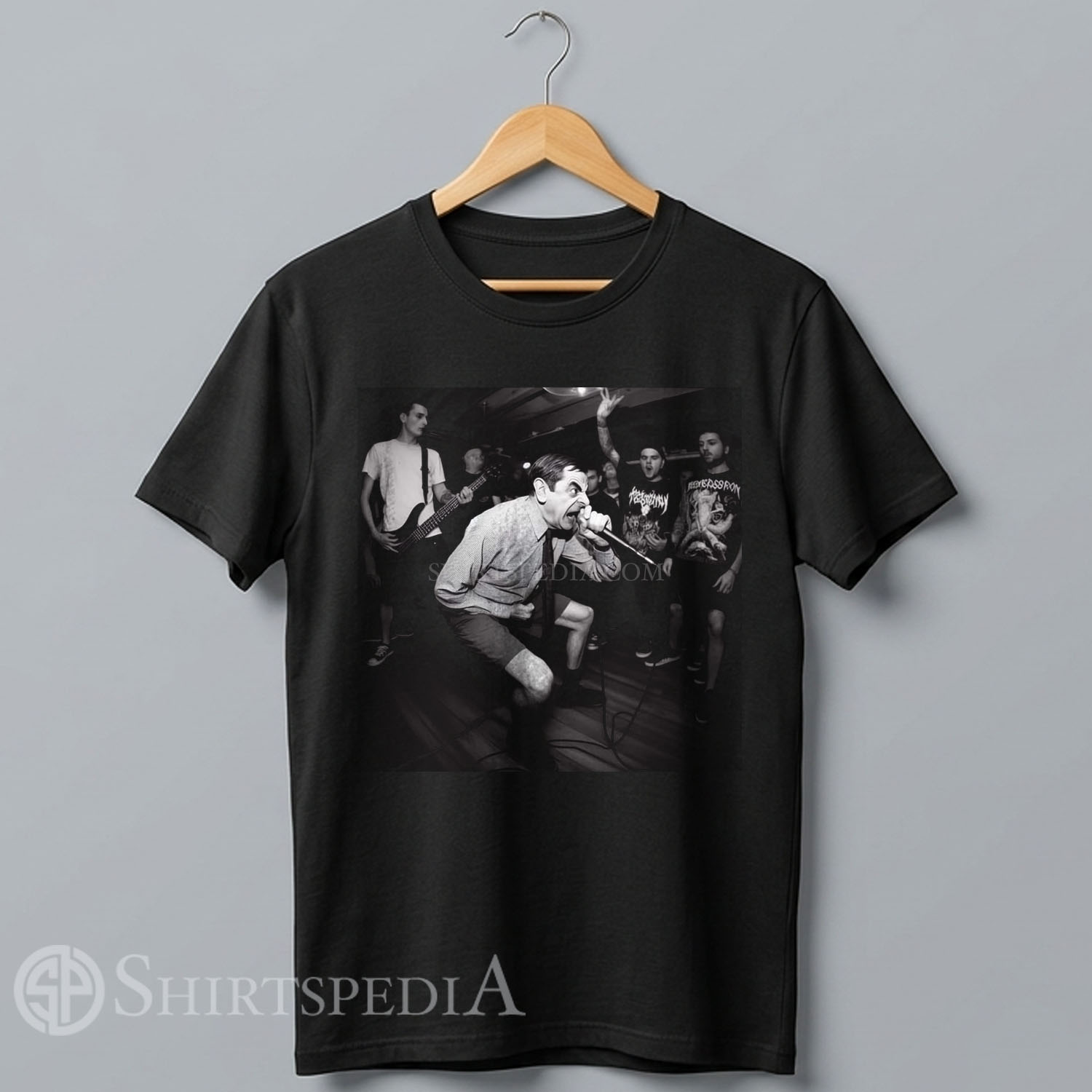 black t-shirt featuring a black and white graphic photo of Mr. Bean screaming into a microphone as the lead vocalist of a hardcore metal basement band.