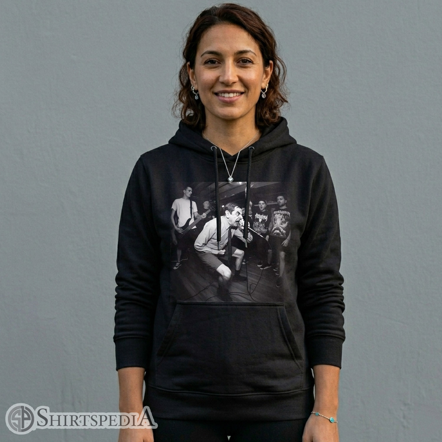 Womens Heavyweight black streetwear hoodie with an adjustable drawstring hood, displaying a large central black and white print of Mr. Bean screaming as a metal lead singer.