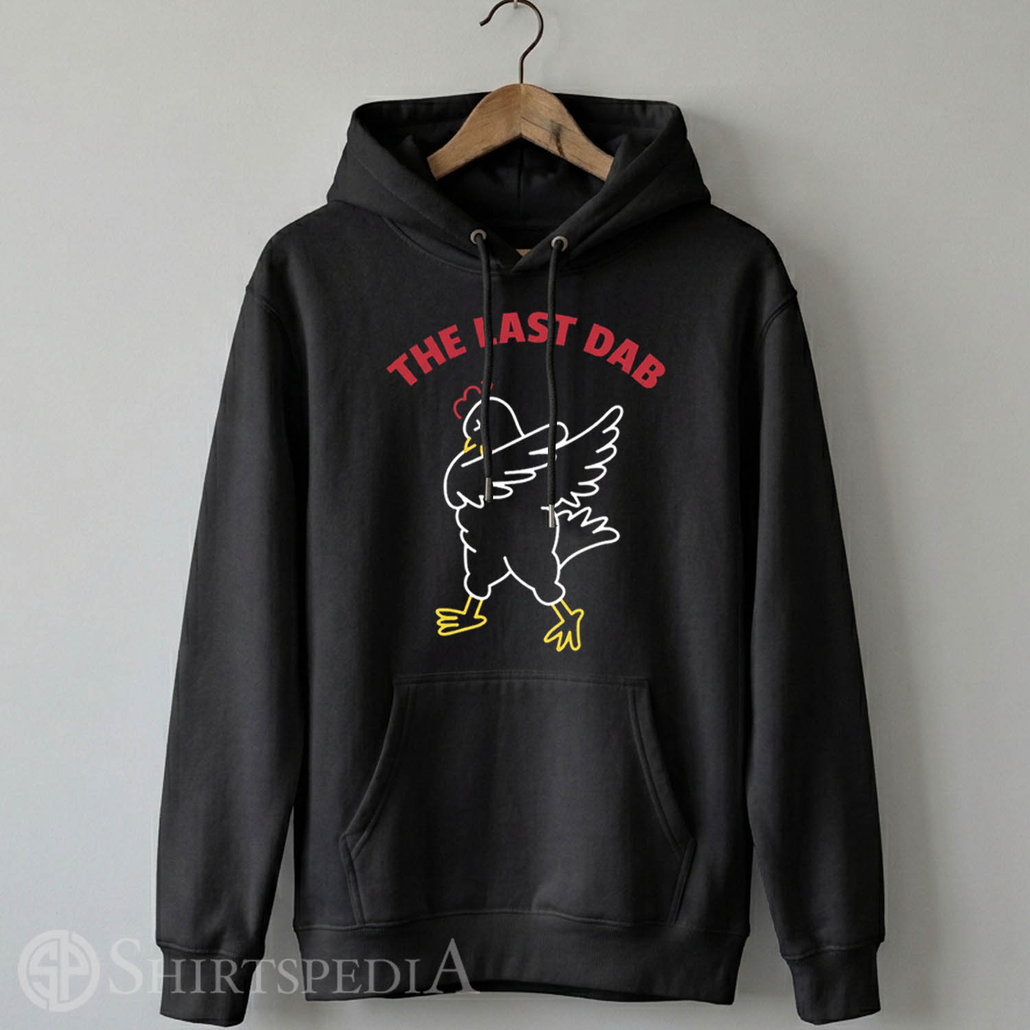 Black pullover hoodie with an adjustable drawstring hood, displaying the Hot Ones dabbing chicken logo with The Last Dab text centered on the chest.