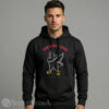 Men Black pullover hoodie with an adjustable drawstring hood, displaying the Hot Ones dabbing chicken logo with The Last Dab text centered on the chest.
