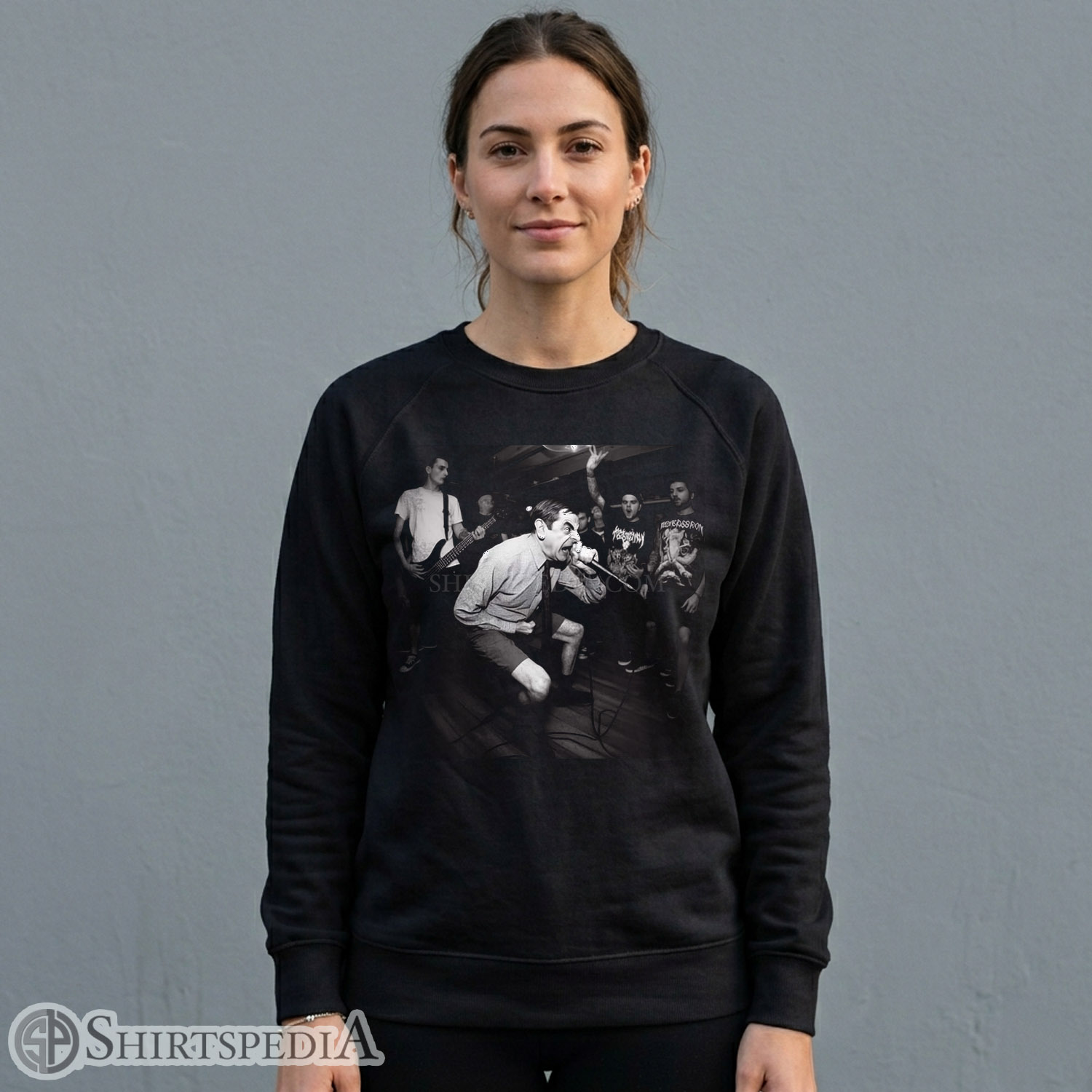 Womens black crewneck pullover sweatshirt printed with a large central black and white graphic of Mr. Bean as a hardcore metal frontman holding a microphone.