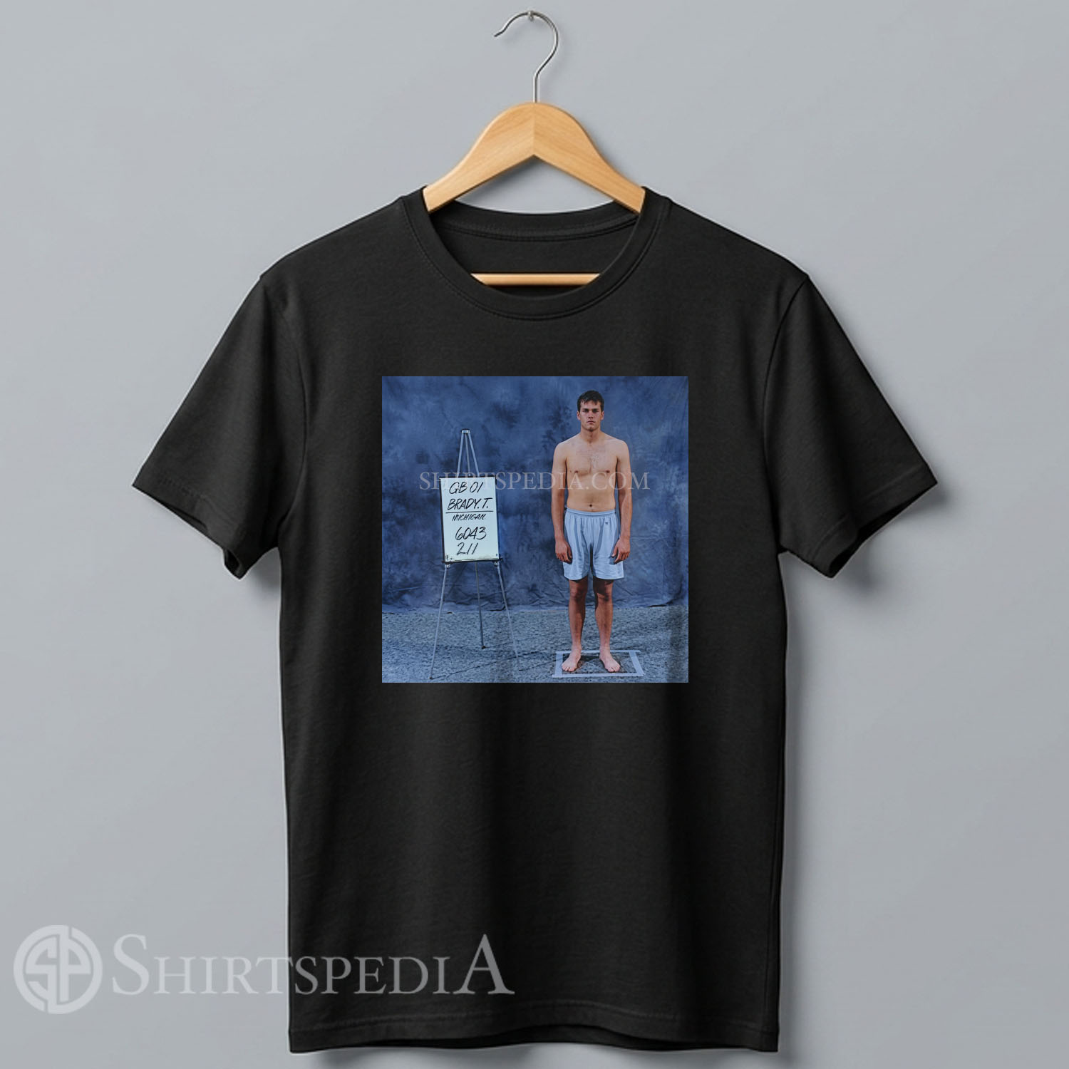 black streetwear t-shirt featuring a retro 2000s style distressed graphic of Tom Brady's famous Scouting Combine photo with the year 2000.