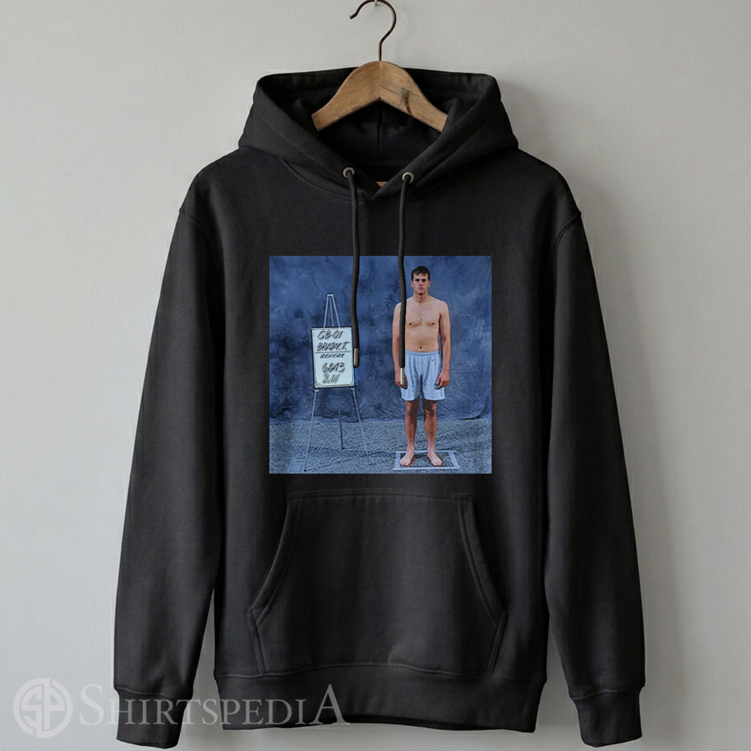 Heavyweight black streetwear pullover hoodie displaying a large central vintage 2000 NFL Scouting Combine design of Tom Brady.