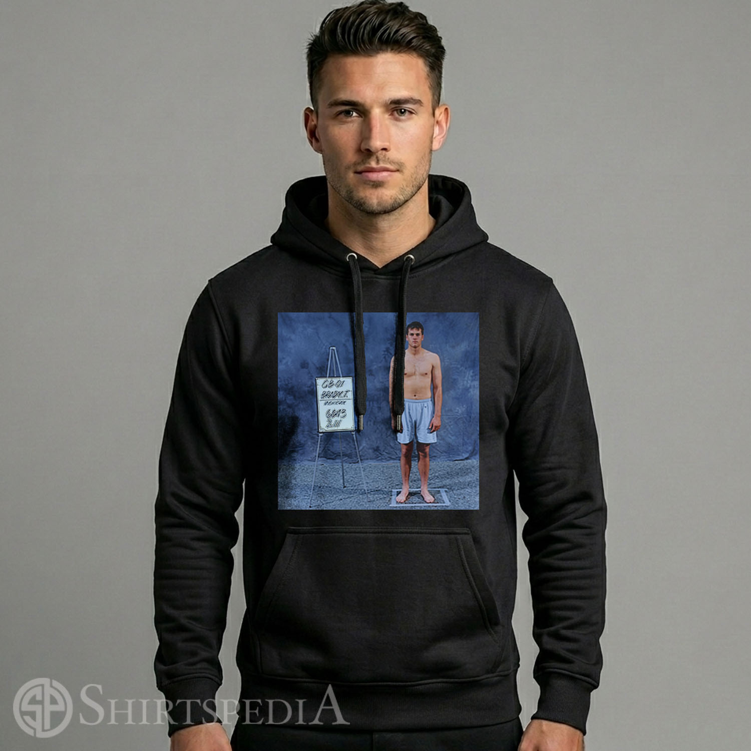 Men Heavyweight black streetwear pullover hoodie displaying a large central vintage 2000 NFL Scouting Combine design of Tom Brady.