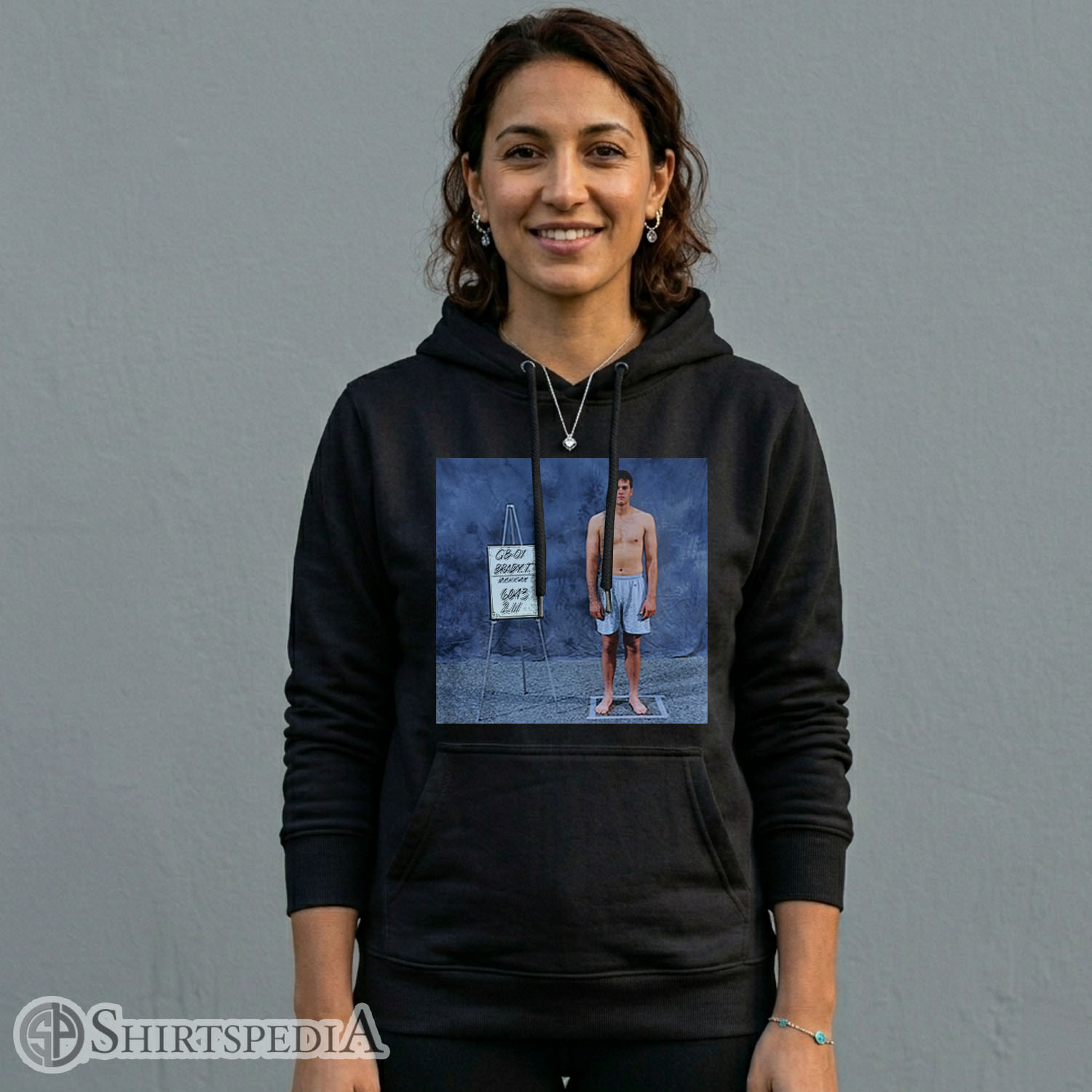 Women Heavyweight black streetwear pullover hoodie displaying a large central vintage 2000 NFL Scouting Combine design of Tom Brady.